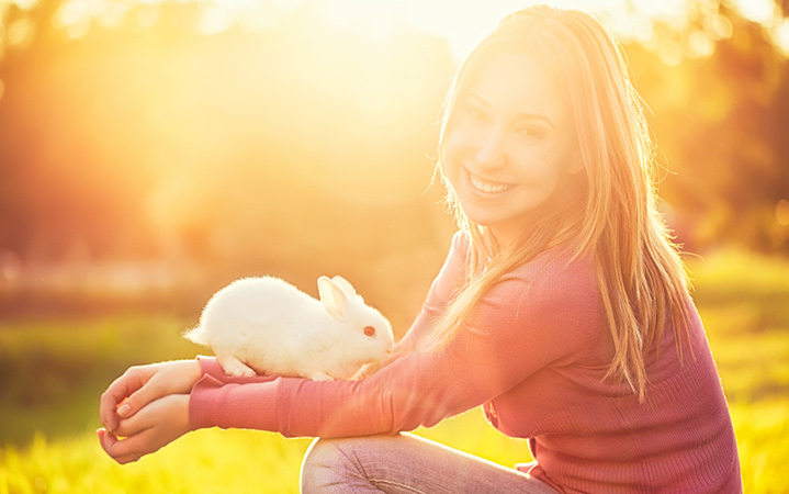 young girl with rabbit